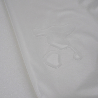 Square ergonomic dog cushion - RePET Teddy in beige